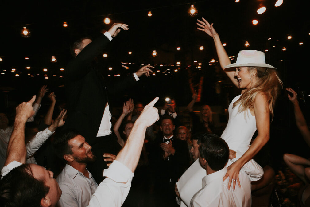 Bride and groom dance at a themed wedding