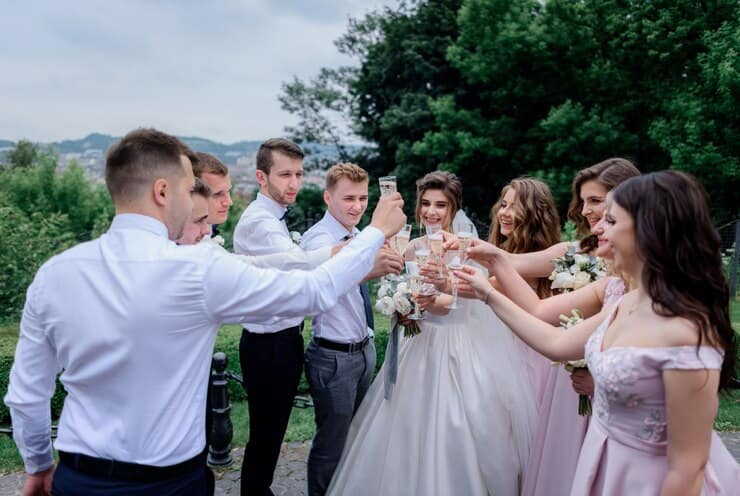 Wedding Couple and Guests Celebrating Outdoor