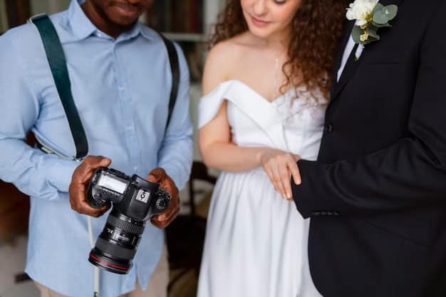 Bride and groom looking at pictures on the camera